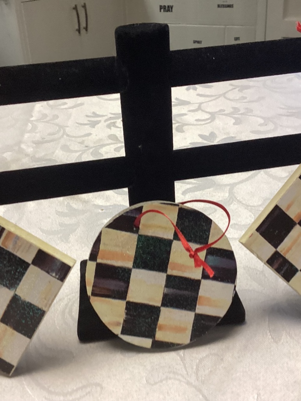 Mackenzie Childs wooden ornaments with string three total in the style of